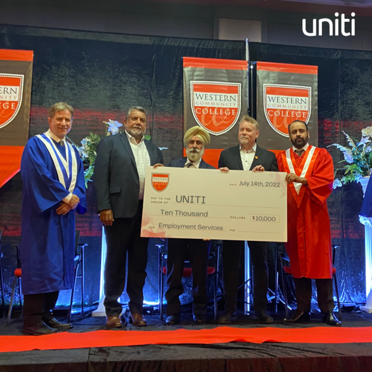 UNITI receiving a $10,000 donation from Western Community College.