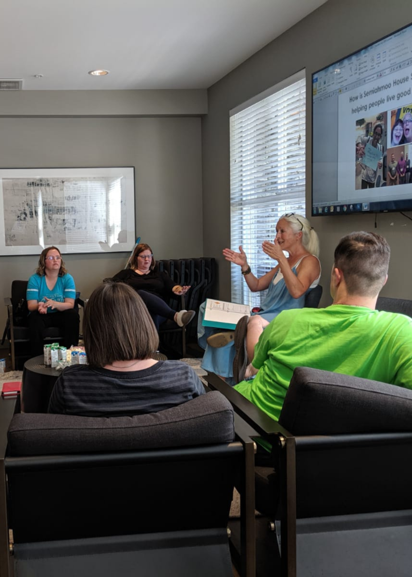 Nolda meets with Self Advocates and people in UNITI's services in the Common Room of UNITI's Chorus Apartments.